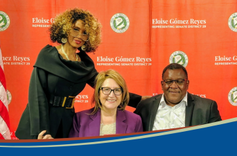Director Moore with his wife and Senator Reyes
